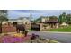 Beautiful community entrance with stone gate, horse statues and floral displays at 2665 Crowbrook Way, Cumming, GA 30040