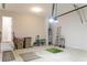 Neat garage with shelves, storage bins, ladder and access to interior of home at 2665 Crowbrook Way, Cumming, GA 30040