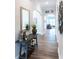 Inviting entryway with hardwood floors, decorative accents, and arched doorways at 2665 Crowbrook Way, Cumming, GA 30040