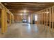 Large, unfinished basement ready for customization with exposed framing and concrete floor at 2665 Crowbrook Way, Cumming, GA 30040