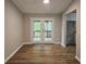 Bright dining room featuring hardwood floors and sliding glass doors at 85 Holly Dr, Carrollton, GA 30116