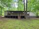 Home exterior with a large yard at 85 Holly Dr, Carrollton, GA 30116