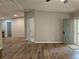 Inviting living area with hardwood floors, neutral walls, and a front door entrance at 85 Holly Dr, Carrollton, GA 30116