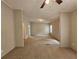 Inviting living room with a ceiling fan and neutral carpeting at 85 Holly Dr, Carrollton, GA 30116