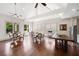 Community lounge with dining tables, chairs, a large table and kitchen equipment at 307 Serenity Way, Woodstock, GA 30188
