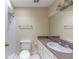 Clean bathroom with a white sink and vanity, and a tiled shower and toilet at 346 Carpenter Dr # 70, Atlanta, GA 30328