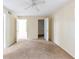 Comfortable bedroom featuring carpeted floors, a ceiling fan, and ample space at 346 Carpenter Dr # 70, Atlanta, GA 30328