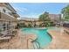 Community pool surrounded by lounge chairs and seating areas, perfect for relaxation at 346 Carpenter Dr # 70, Atlanta, GA 30328
