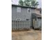 Fenced backyard with access door, showcasing a private outdoor space perfect for relaxation or entertainment at 3500 Ten Oaks Ct, Powder Springs, GA 30127