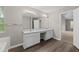 Bathroom with double sinks, large mirror, and entry to the main bedroom at 470 Piney Sw Way, Atlanta, GA 30331