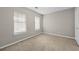 Spare bedroom with two windows allowing for ample natural lighting at 470 Piney Sw Way, Atlanta, GA 30331
