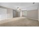 Bedroom with large carpeted area, ceiling fan, and natural light at 470 Piney Sw Way, Atlanta, GA 30331