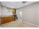 Functional kitchenette with essential appliances, cabinets, and a sink for basic cooking needs at 470 Piney Sw Way, Atlanta, GA 30331