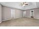 Expansive main bedroom with trey ceiling and carpet, showcasing multiple doorways at 470 Piney Sw Way, Atlanta, GA 30331