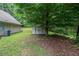 The backyard features a shed for extra storage space at 4732 Browns Mill Ferry Rd, Lithonia, GA 30038