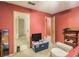 Cozy bedroom with natural light and neutral colors providing a comfortable space at 4732 Browns Mill Ferry Rd, Lithonia, GA 30038