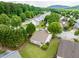 Charming neighborhood aerial view highlighting the well-kept lawns and mature trees at 502 Helene Ct, Woodstock, GA 30188