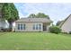 Large, freshly mowed backyard with lush green grass and mature trees at 502 Helene Ct, Woodstock, GA 30188