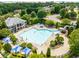 Enjoy a relaxing day at this community pool with a slide, lounge chairs, and a spacious deck area at 502 Helene Ct, Woodstock, GA 30188
