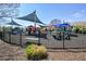 Community playground shaded with awnings, providing children a fun outdoor play area at 502 Helene Ct, Woodstock, GA 30188