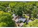 Aerial view of a neighborhood with mature trees, showcasing the home and surrounding properties at 522 Trabert Nw Ave, Atlanta, GA 30309