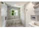Modern bathroom featuring a glass-enclosed shower with stylish tile work at 522 Trabert Nw Ave, Atlanta, GA 30309
