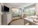 Bright bathroom featuring a double vanity, large mirrors, and natural light at 522 Trabert Nw Ave, Atlanta, GA 30309