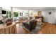 Expansive primary bedroom featuring hardwood floors, sitting area, and abundant natural light at 522 Trabert Nw Ave, Atlanta, GA 30309
