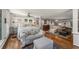 Bright and airy bedroom with sitting area, hardwood floors, and neutral decor at 522 Trabert Nw Ave, Atlanta, GA 30309