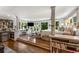 Spacious bedroom retreat with large windows, hardwood floors and a relaxing sitting area at 522 Trabert Nw Ave, Atlanta, GA 30309