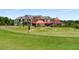 Beautiful golf course clubhouse with lush green surroundings at 522 Trabert Nw Ave, Atlanta, GA 30309