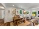Inviting dining area with hardwood floors, wooden table, and natural light at 522 Trabert Nw Ave, Atlanta, GA 30309