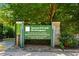 Tanyard Creek Greenspace sign with posted rules and regulations at 522 Trabert Nw Ave, Atlanta, GA 30309
