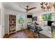 Charming home office with built-in shelving, natural light, and hardwood floors at 522 Trabert Nw Ave, Atlanta, GA 30309