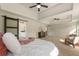 Spacious bedroom with a ceiling fan, walk-in closet and an ensuite bathroom at 191 Kyndal Dr, Hampton, GA 30228