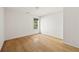 Bright and airy bedroom featuring hardwood floors and natural light from a window at 2890 Winterhaven Ct, Atlanta, GA 30360