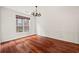 Dining room with hardwood floors, decorative molding and a large window at 2890 Winterhaven Ct, Atlanta, GA 30360