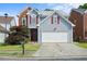 Charming two-story home featuring brick and siding accents with a well-manicured front yard at 2890 Winterhaven Ct, Atlanta, GA 30360