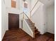 Bright foyer with hardwood floors, a staircase, and a view of the front door at 2890 Winterhaven Ct, Atlanta, GA 30360