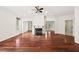Spacious living room with hardwood floors, a fireplace, and natural light at 2890 Winterhaven Ct, Atlanta, GA 30360