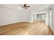 Spacious main bedroom with a ceiling fan, columns, and natural light from the window at 2890 Winterhaven Ct, Atlanta, GA 30360