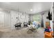 Versatile bonus room with unique macrame swings and plenty of space for recreation at 468 Lake Ridge Ln, Fairburn, GA 30213