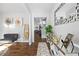 Elegant entryway boasting hardwood floors, stylish decor, and a welcoming ambiance at 468 Lake Ridge Ln, Fairburn, GA 30213