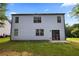 A back view of the house, highlighting the siding and backyard at 468 Lake Ridge Ln, Fairburn, GA 30213