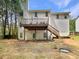Spacious backyard with a wooden deck and potential for outdoor enjoyment at 6001 Deer Springs Nw Ln, Acworth, GA 30101