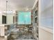Modern bathroom featuring a glass shower with tiled walls, a bench, and a pebbled floor at 6001 Deer Springs Nw Ln, Acworth, GA 30101