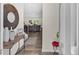 Inviting entryway with hardwood floors, decorative accents, and open sightlines to the living area at 104 Auburn Crossing Way, Auburn, GA 30011