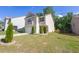 Well-maintained two-story home with tidy landscaping, offering great curb appeal in a suburban setting at 104 Auburn Crossing Way, Auburn, GA 30011