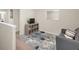 Comfortable loft area with a cozy sofa and stylish decor at 104 Auburn Crossing Way, Auburn, GA 30011