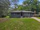 Charming single-story home featuring a well-manicured lawn and freshly painted exterior at 1643 Flintwood Se Dr, Atlanta, GA 30316